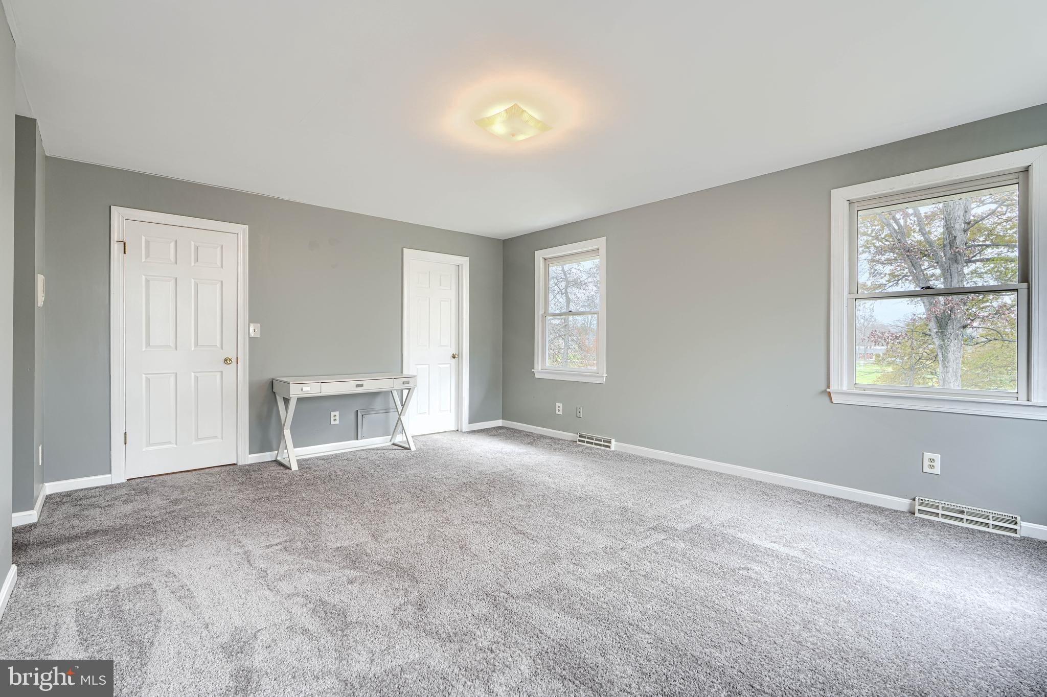 2508 Perring Woods Road Baltimore, MD 21234 - Photo 31 of 42 a view of an empty room with a window