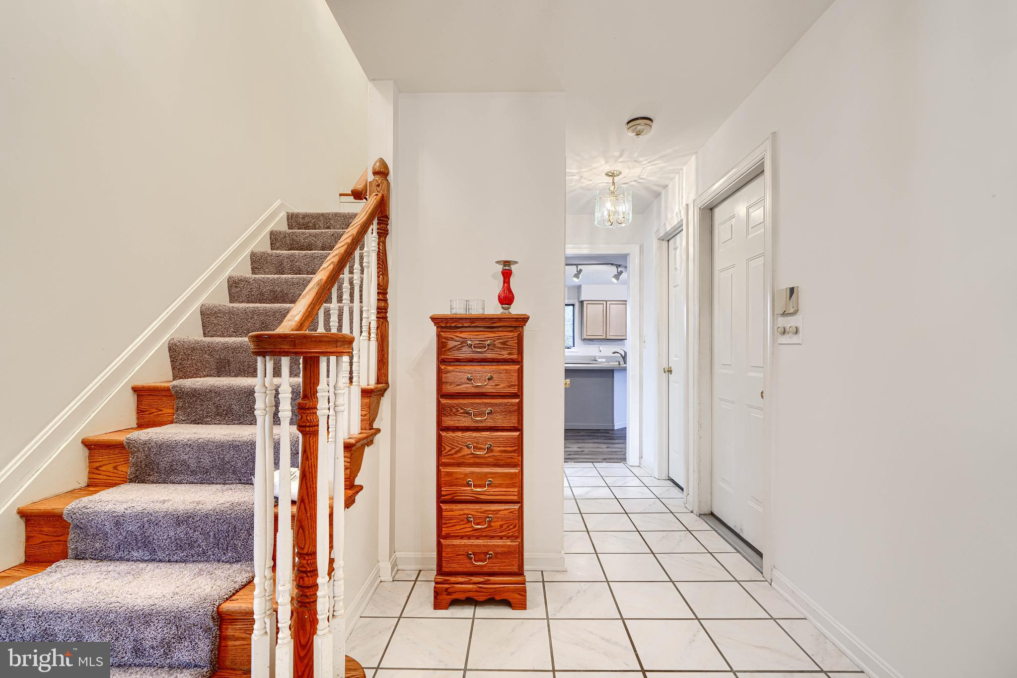 2508 Perring Woods Road Baltimore, MD 21234 - Photo 5 of 42 a view of an entryway with staircase