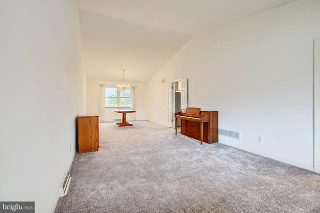 a bathroom with a sink toilet and a mirror