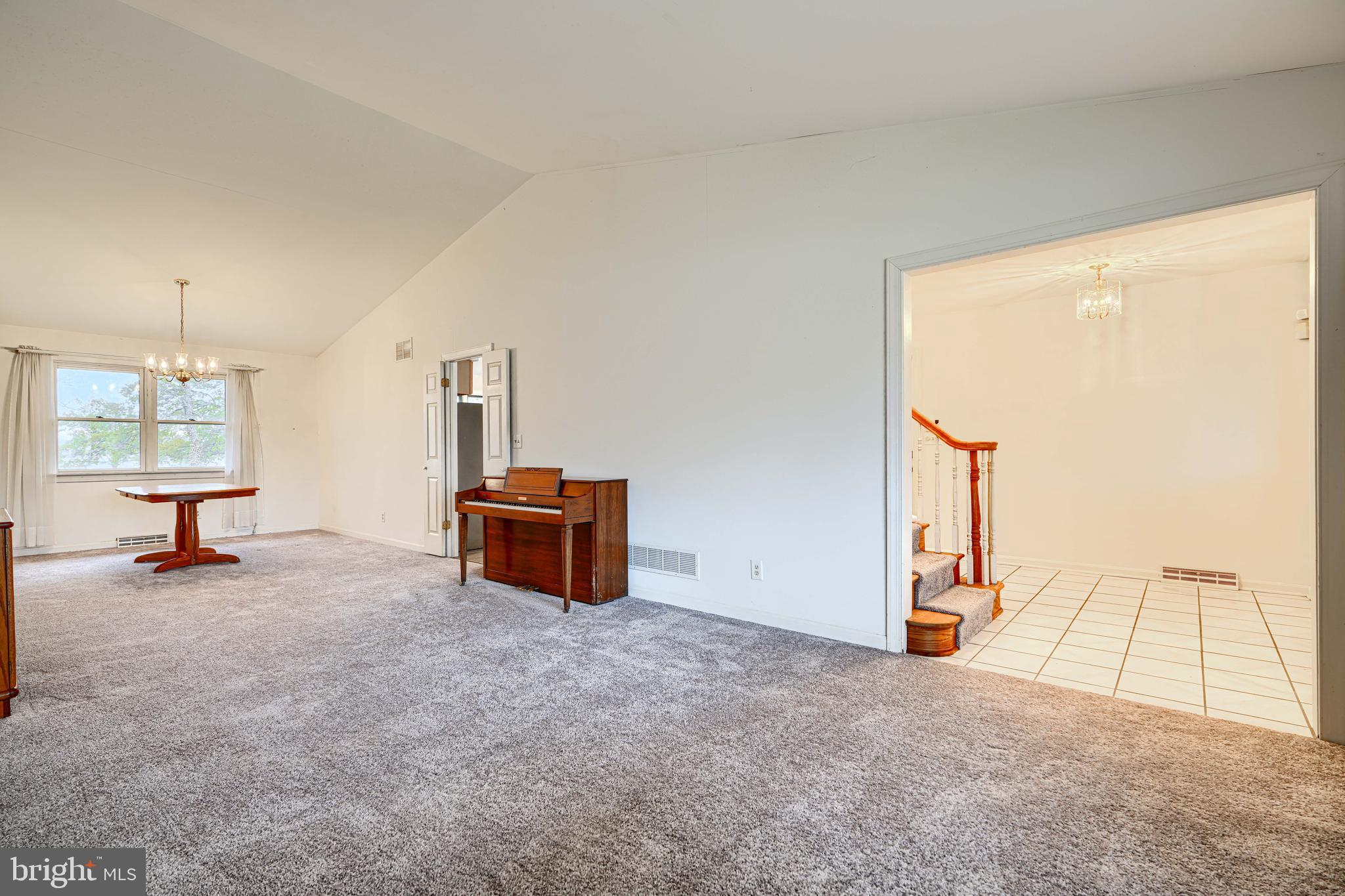 2508 Perring Woods Road Baltimore, MD 21234 - Photo 9 of 42 a view of a livingroom with furniture and a window