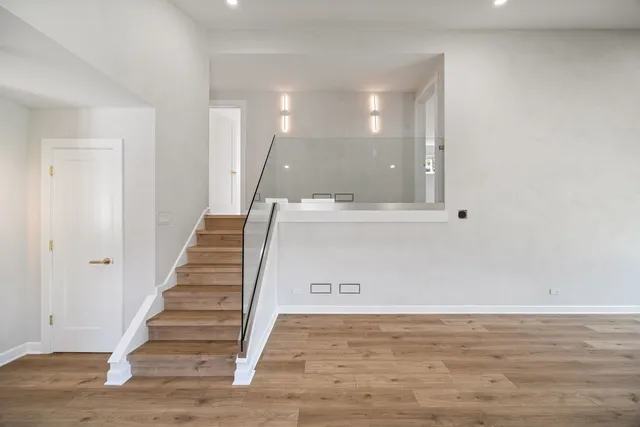 a view of a hallway with staircase