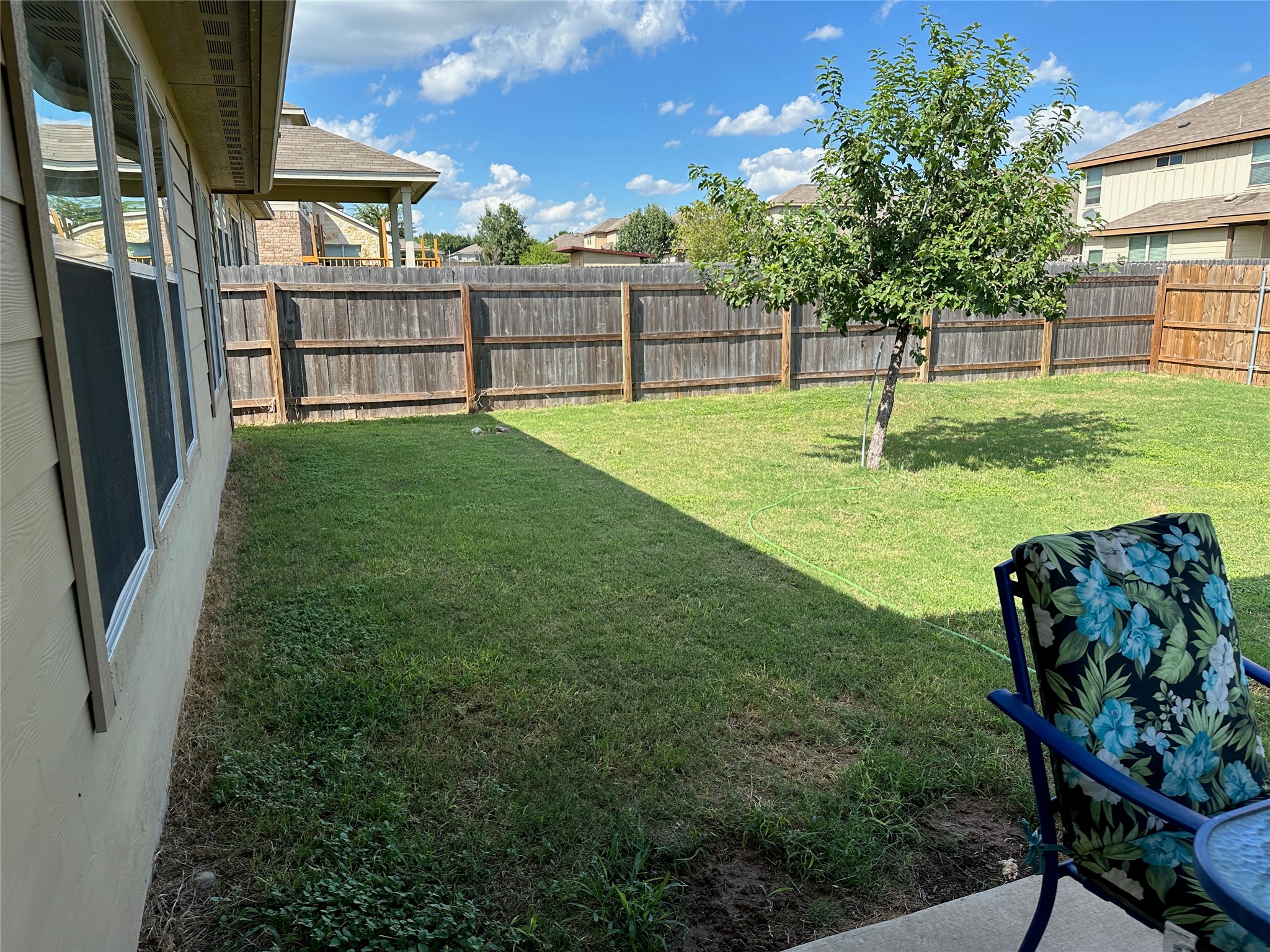 207 Dragon Ridge Road Buda, TX 78610 - Photo 13 of 38 Privacy fence, native trees planted