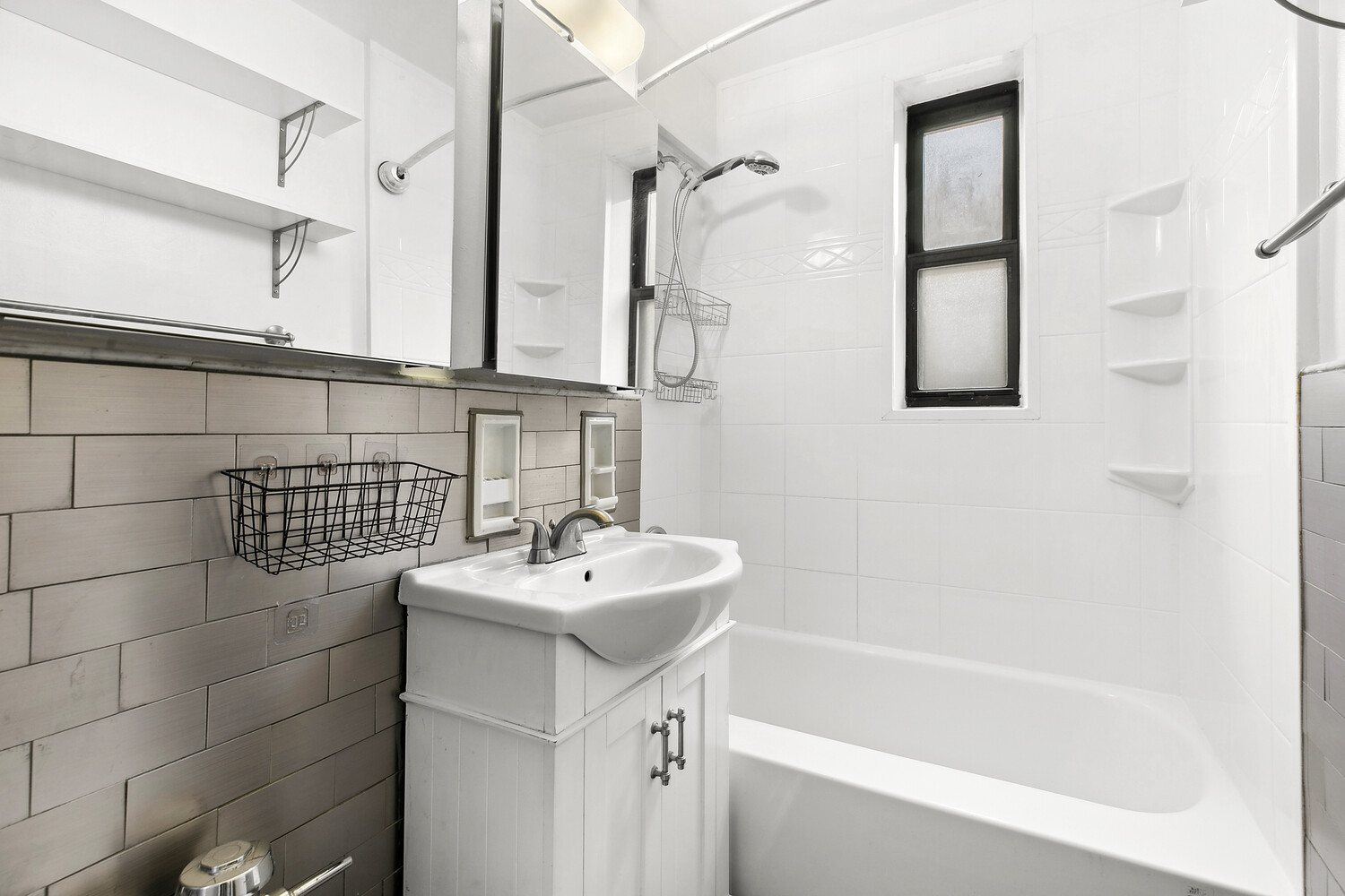330 East 80th Street, Unit 3K Manhattan, NY 10075 - Photo 3 of 8 a bathroom with a sink and a bathtub