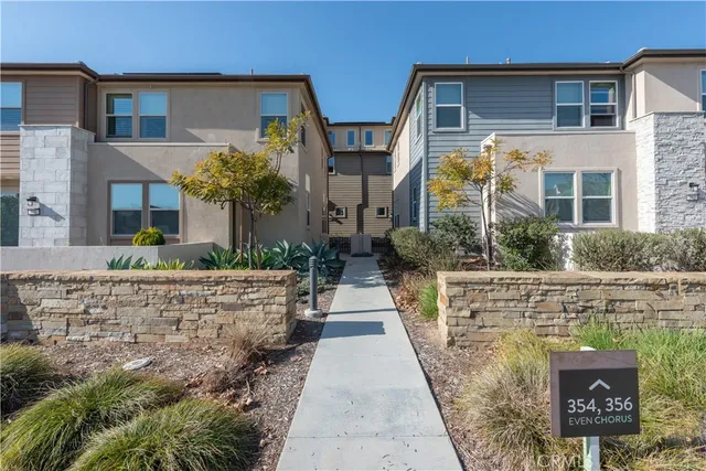 a front view of house with outdoor space