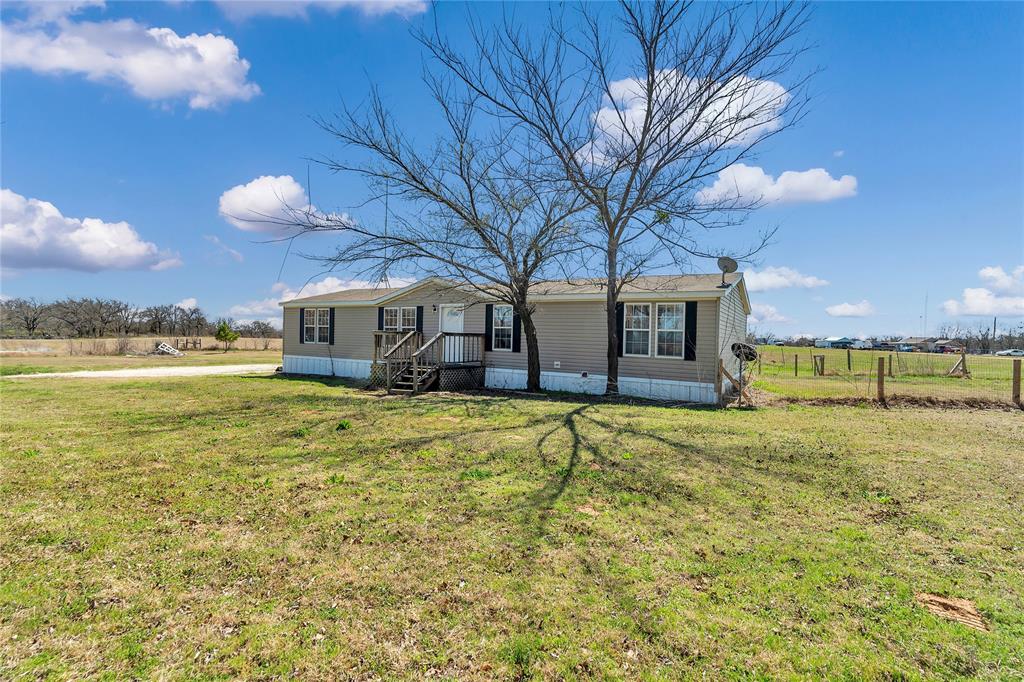 680 Hcr 1429 Covington, TX 76636 - Photo 1 of 1 Manufactured / mobile home with a front yard and fence