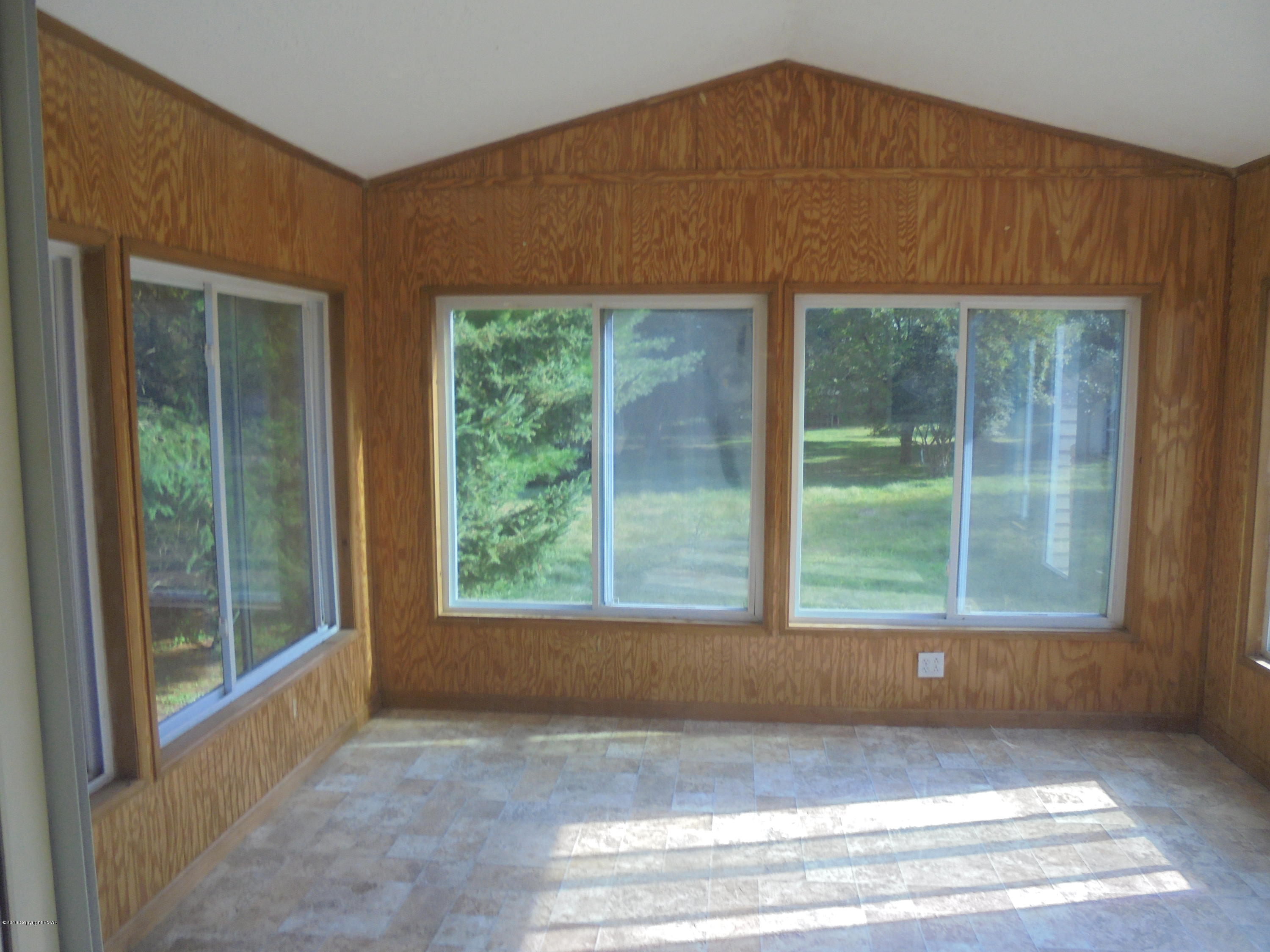 246 Lower Swiftwater Road Cresco, PA 18326 - Photo 7 of 24 sunroom off kitchen