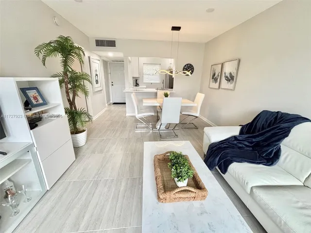 a living room with furniture and a couch