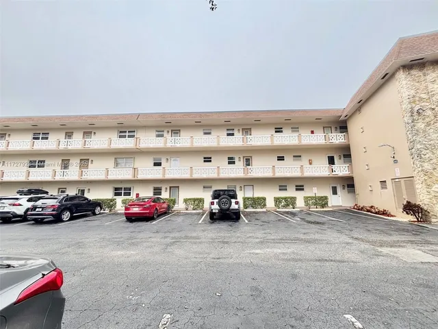 a car parked in front of a house