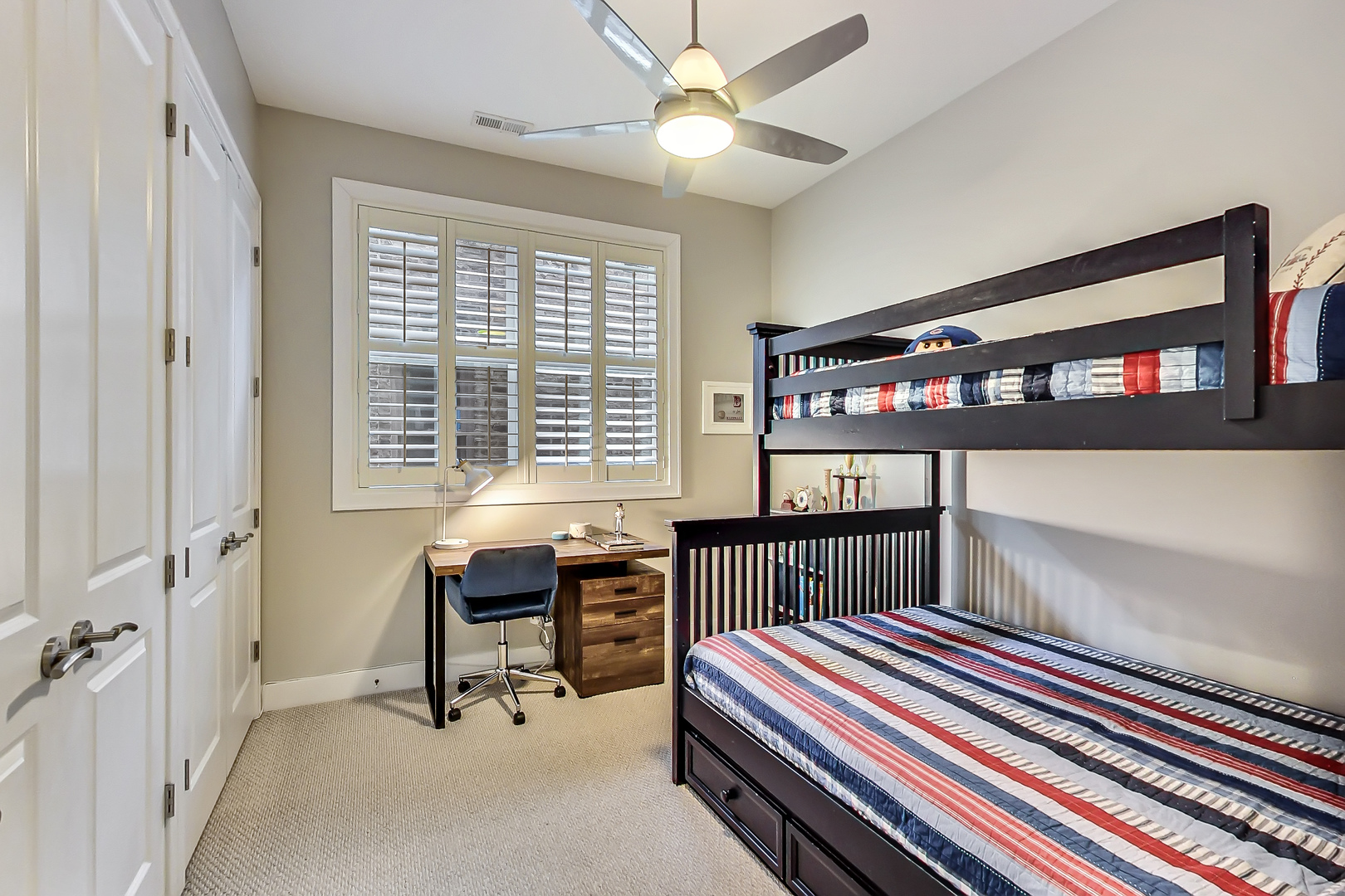 2121 West Roscoe Street, Unit 2 Chicago, IL 60618 - Photo 20 of 24 a bedroom with furniture and a window