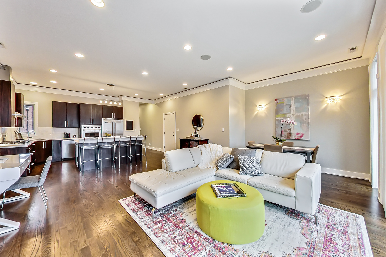 2121 West Roscoe Street, Unit 2 Chicago, IL 60618 - Photo 4 of 24 a living room with furniture and a wooden floor