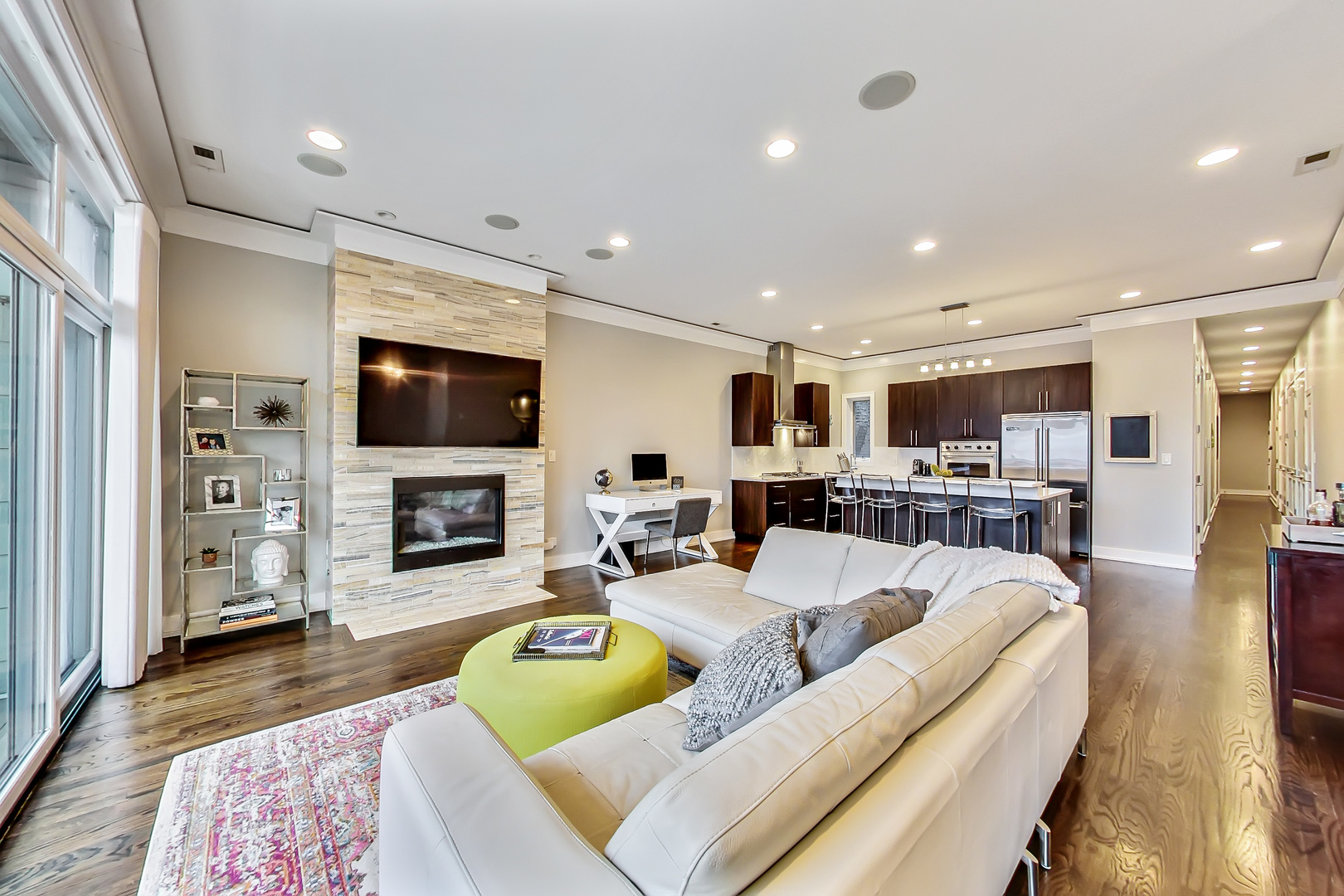 2121 West Roscoe Street, Unit 2 Chicago, IL 60618 - Photo 5 of 24 a living room with furniture and a flat screen tv