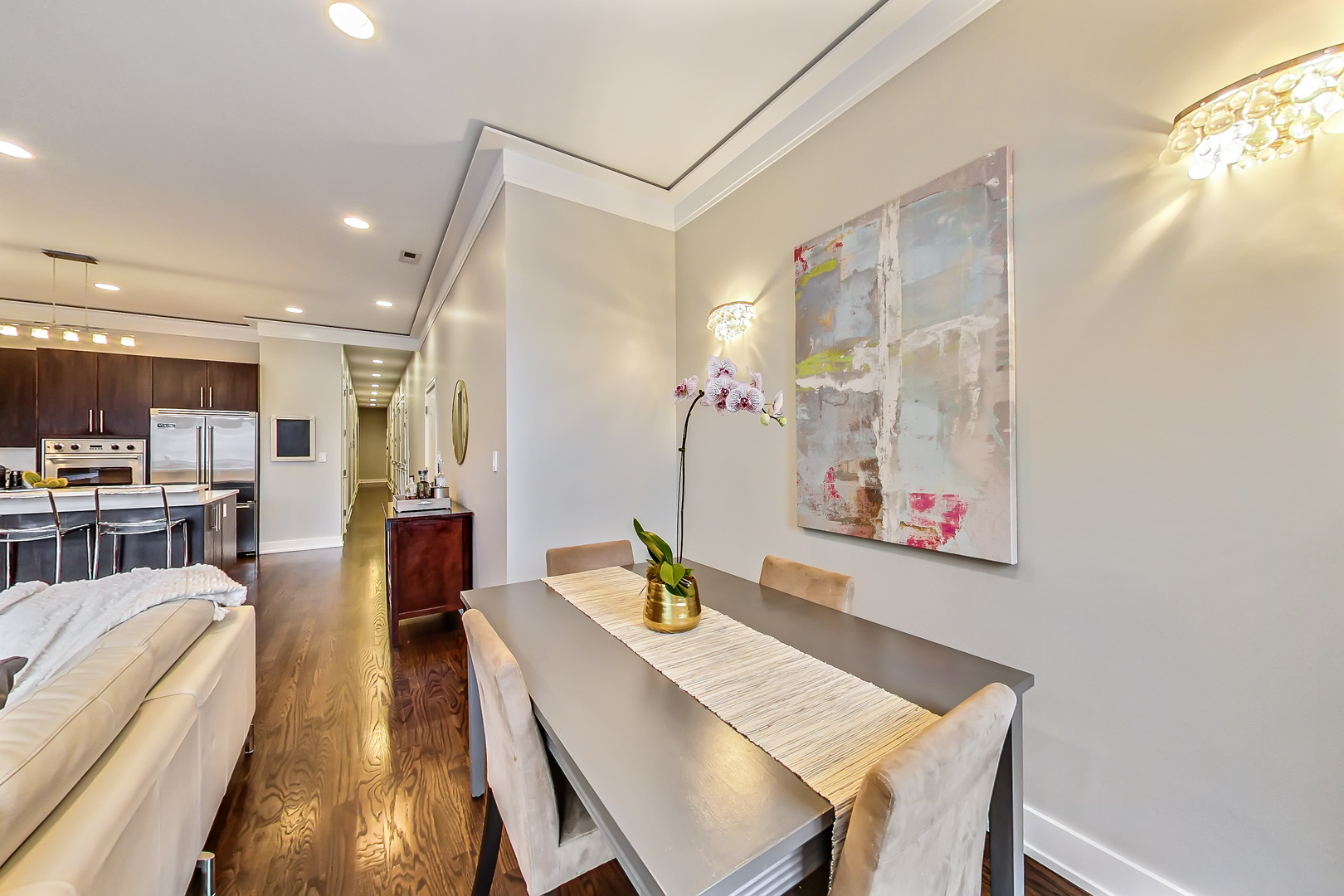 2121 West Roscoe Street, Unit 2 Chicago, IL 60618 - Photo 6 of 24 a living room with furniture and kitchen view