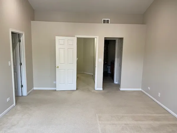 a view of an empty walk in closet
