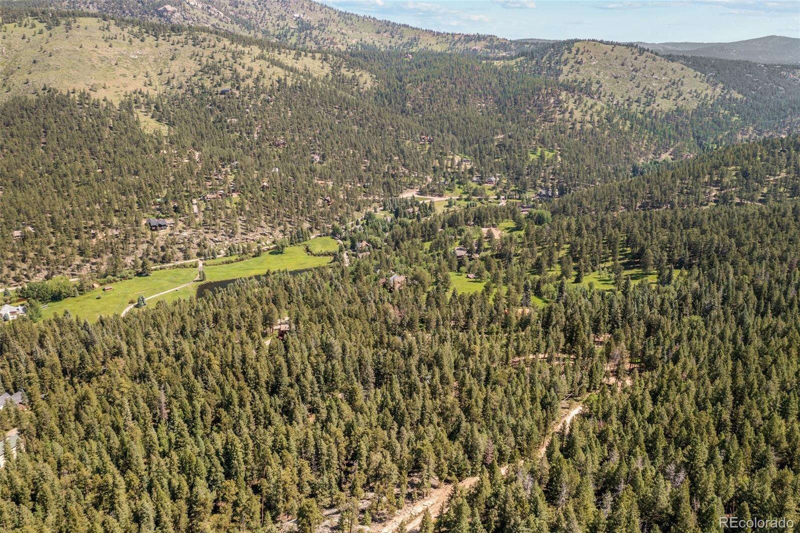 34095 Columbine Circle Evergreen, CO 80439 - Photo 11 of 32 a view of residential houses with mountain view