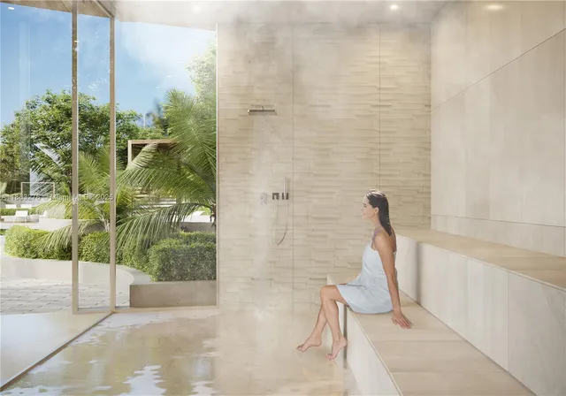 a view of swimming pool with a garden and plants