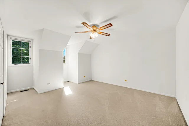 a bathroom with a sink a mirror and a shower