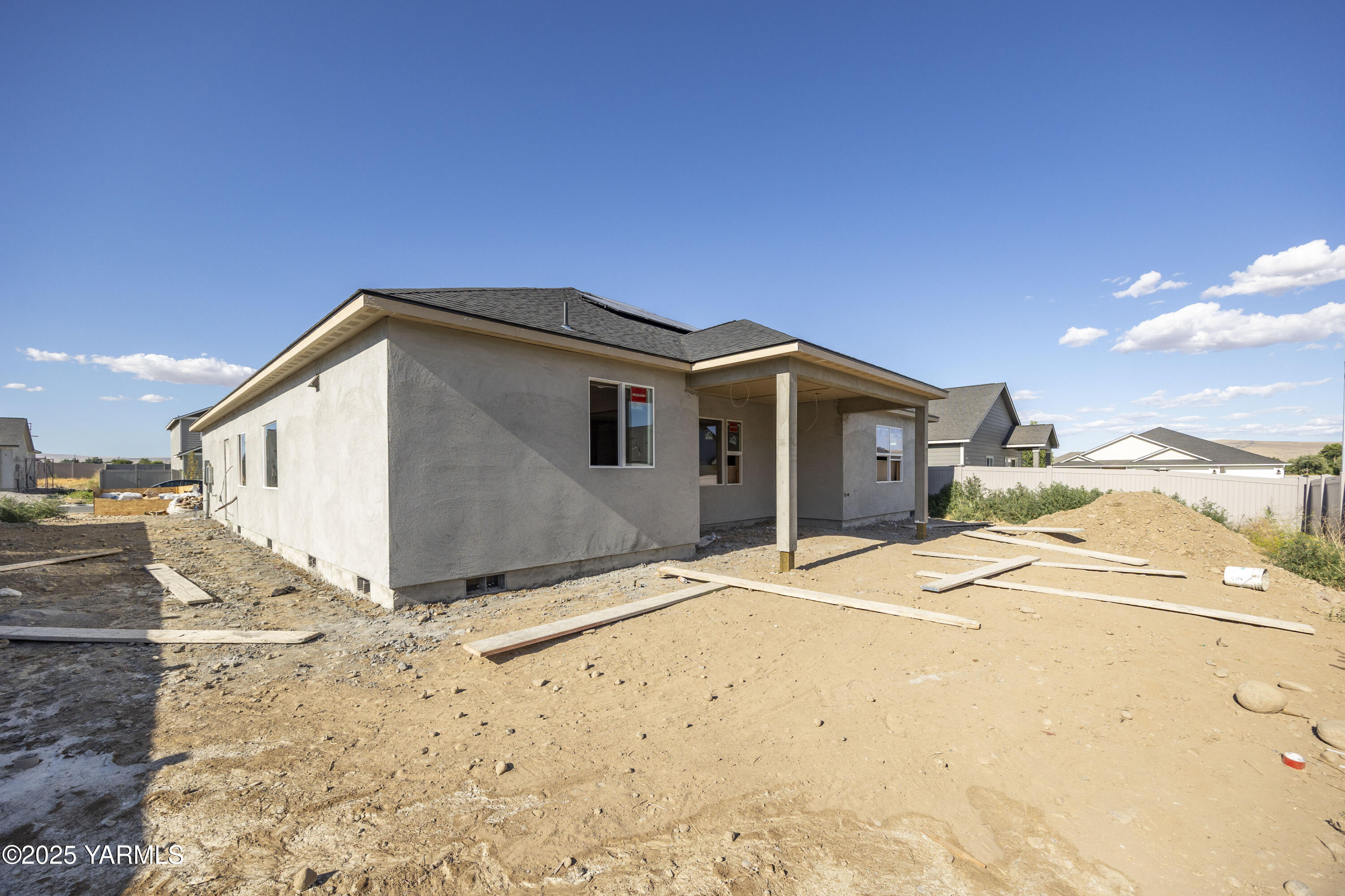 206 Shrute Road Prosser, WA 99350 - Photo 9 of 9 a front view of a house with a dirt yard