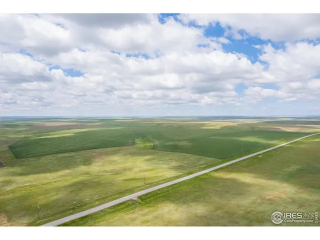 a view of an outdoor space and tennis court