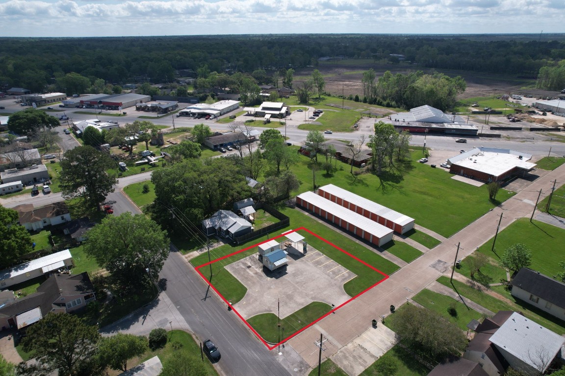 1314 Kipling Street Liberty, TX 77575 - Photo 11 of 18 an aerial view of a house with a big yard