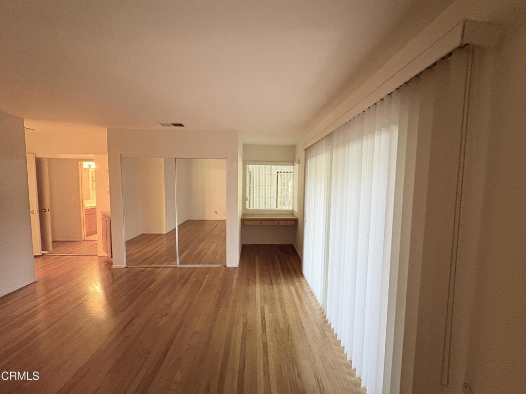 1920 North Altadena Drive Pasadena, CA 91107 - Photo 20 of 25 a view of a room with wooden floor and a window