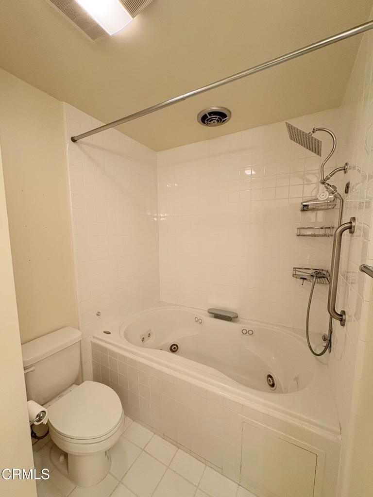 1920 North Altadena Drive Pasadena, CA 91107 - Photo 22 of 25 a bathroom with a shower a toilet and a shower