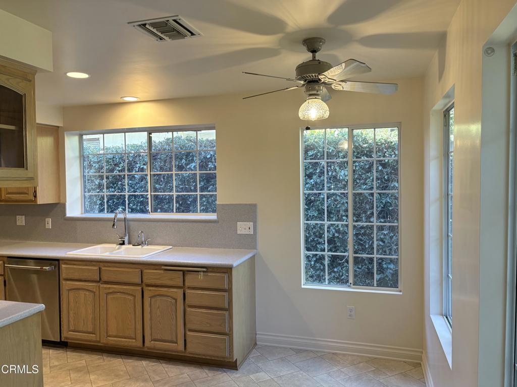 1920 North Altadena Drive Pasadena, CA 91107 - Photo 10 of 25 a bathroom with a sink a vanity a window and a mirror