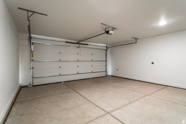 2768 Becco Trail, Unit 63 St. George, UT 84770 - Photo 26 of 27 Garage with baseboards