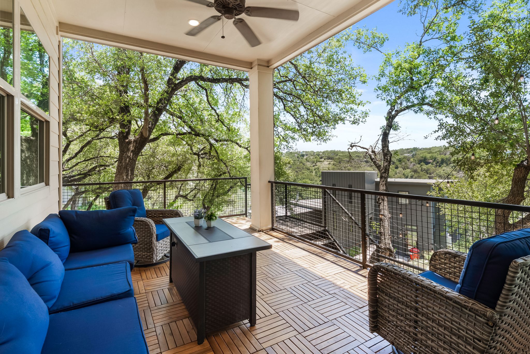 14213 Red Feather Trail Austin, TX 78734 - Photo 31 of 39 a balcony with wooden floor and outdoor seating