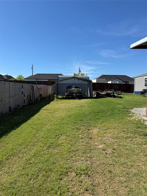 233 Overland Trail Jacksboro, TX 76458 - Photo 2 of 10 a view of a swimming pool and a yard