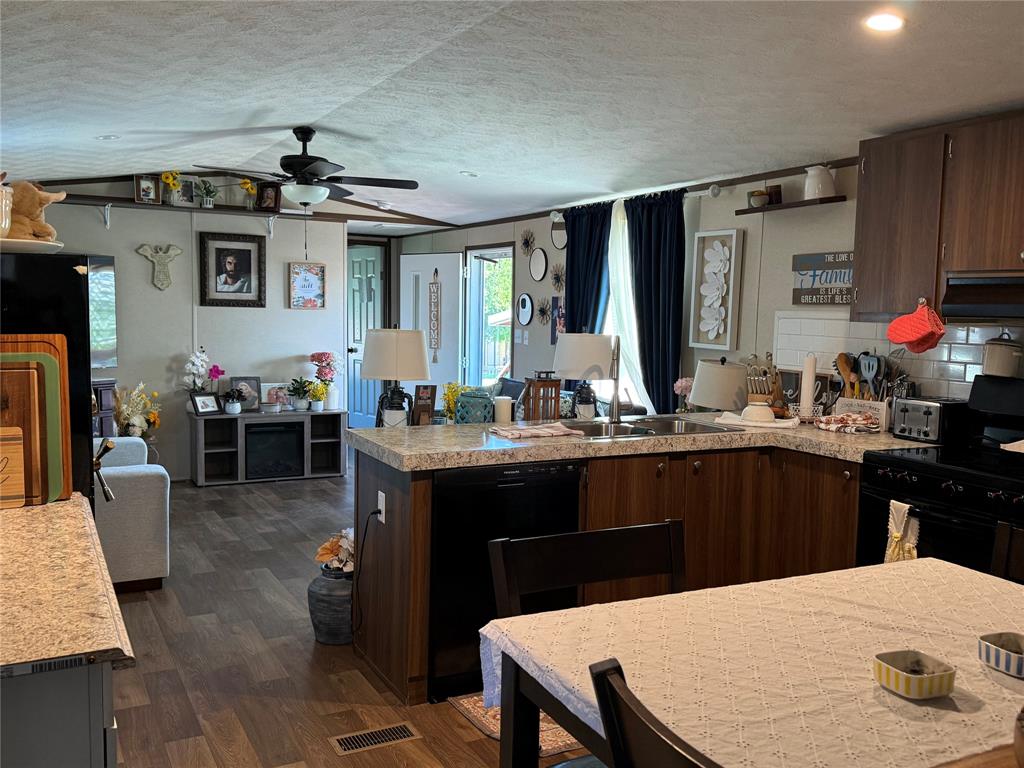 233 Overland Trail Jacksboro, TX 76458 - Photo 10 of 10 a kitchen with a table and chairs in it
