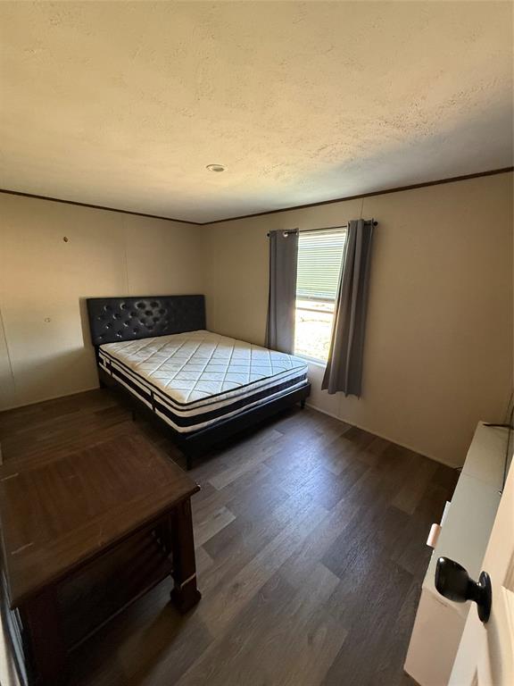 233 Overland Trail Jacksboro, TX 76458 - Photo 7 of 10 a view of a room with wooden floor and window