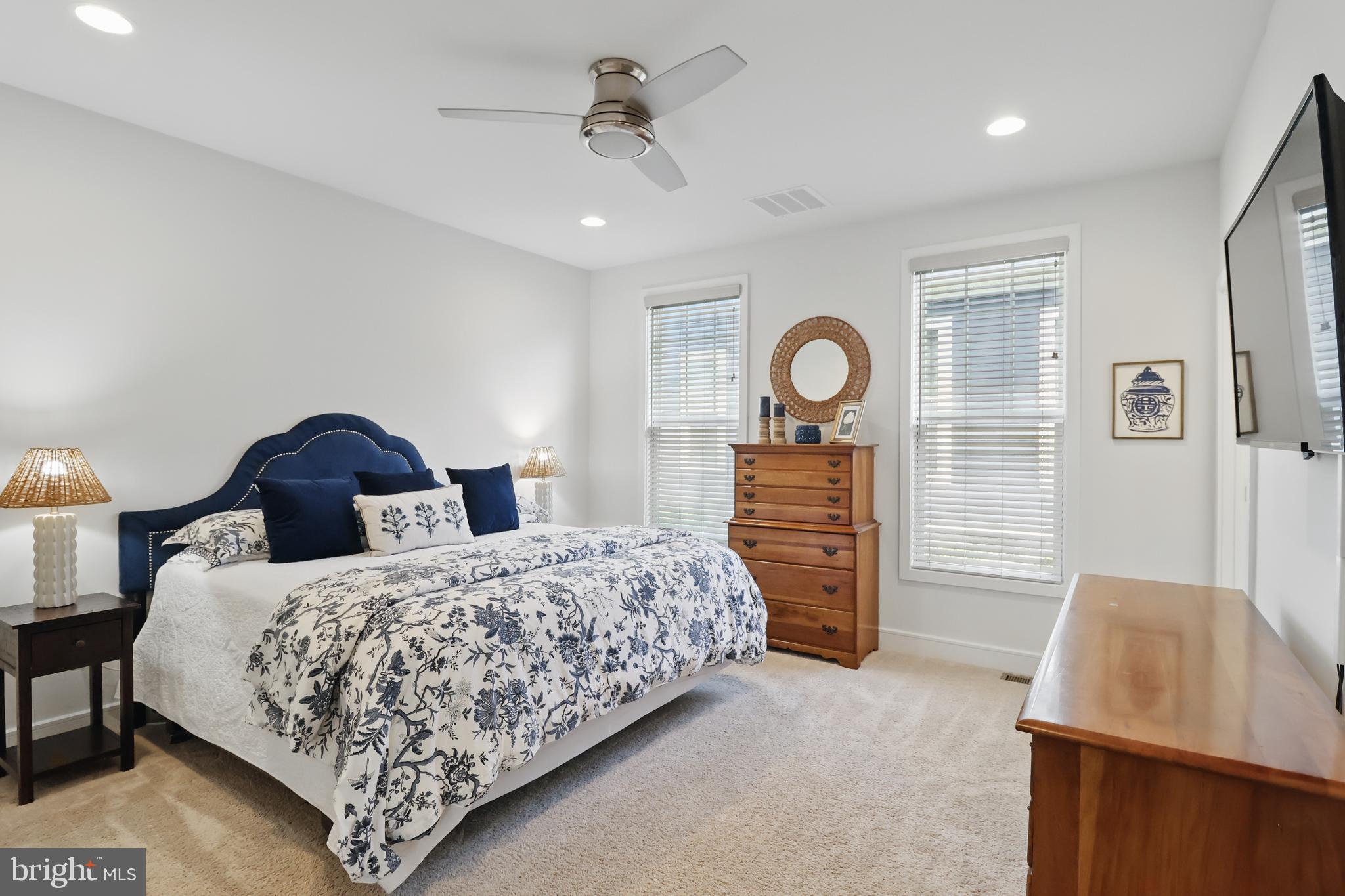 1010 Coubertin Drive Southeast Leesburg, VA 20175 - Photo 22 of 44 a bedroom with a bed and a dresser