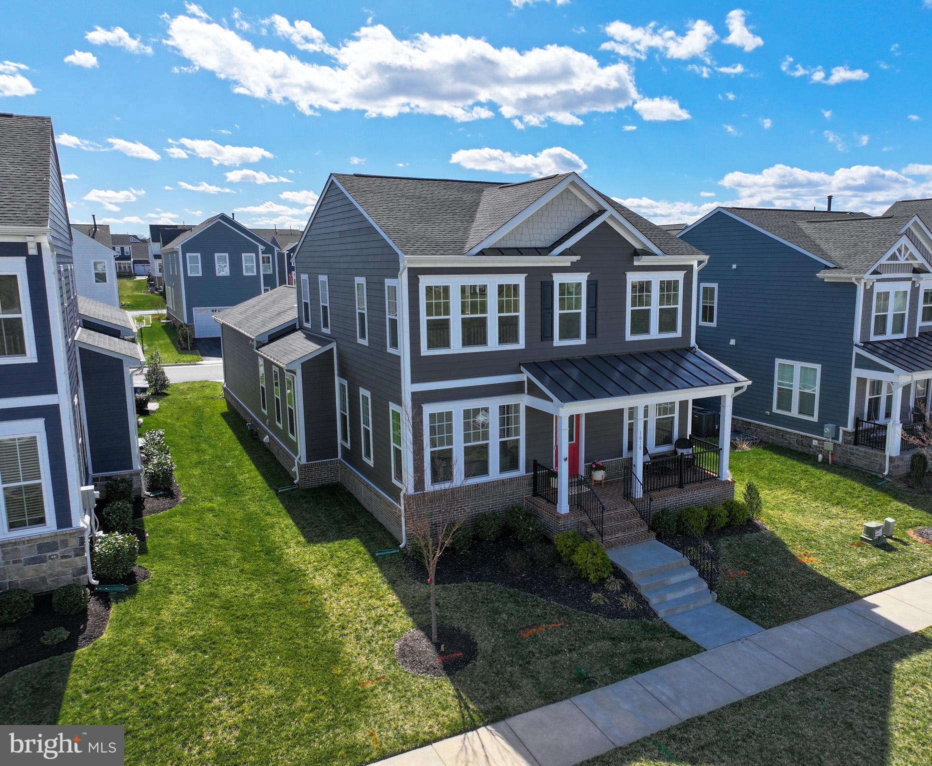 1010 Coubertin Drive Southeast Leesburg, VA 20175 - Photo 3 of 44 a aerial view of a house with a yard
