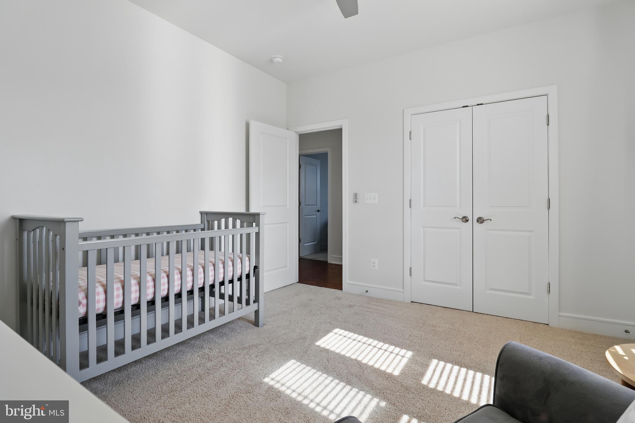 1010 Coubertin Drive Southeast Leesburg, VA 20175 - Photo 33 of 44 a view of a bedroom with furniture