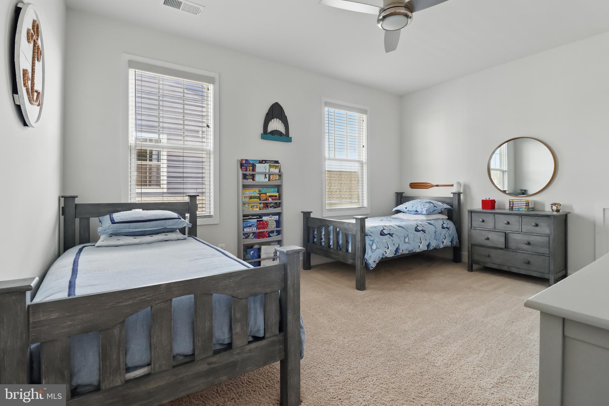 1010 Coubertin Drive Southeast Leesburg, VA 20175 - Photo 35 of 44 a bedroom with bed and a window