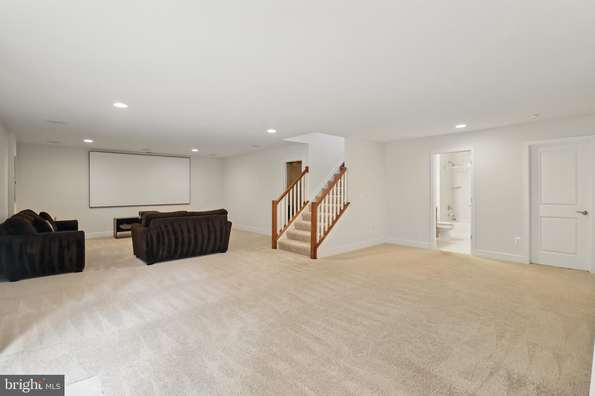 1010 Coubertin Drive Southeast Leesburg, VA 20175 - Photo 36 of 44 a view of an empty room with wooden floor