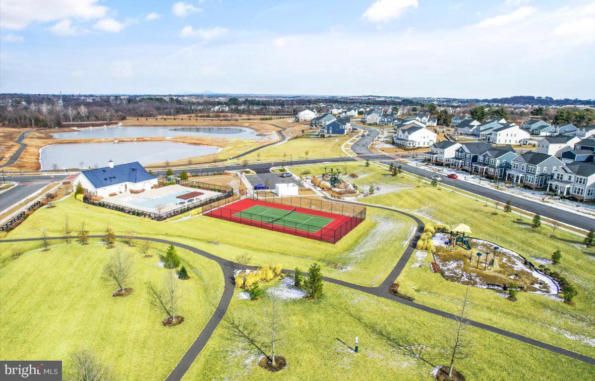 1010 Coubertin Drive Southeast Leesburg, VA 20175 - Photo 4 of 44 a view of a swimming pool with an ocean view