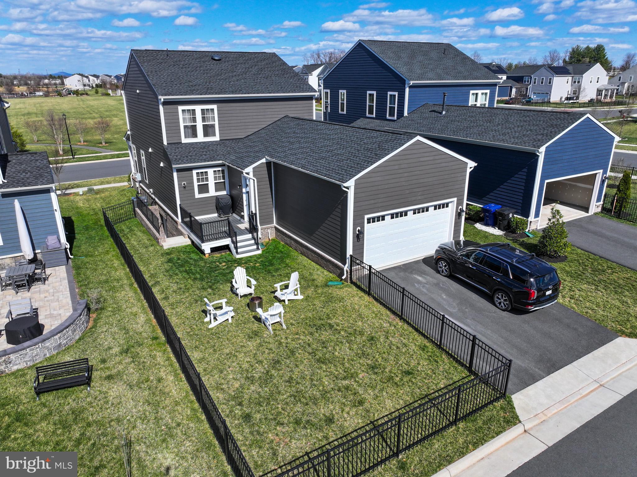 1010 Coubertin Drive Southeast Leesburg, VA 20175 - Photo 44 of 44 an aerial view of a house with swimming pool