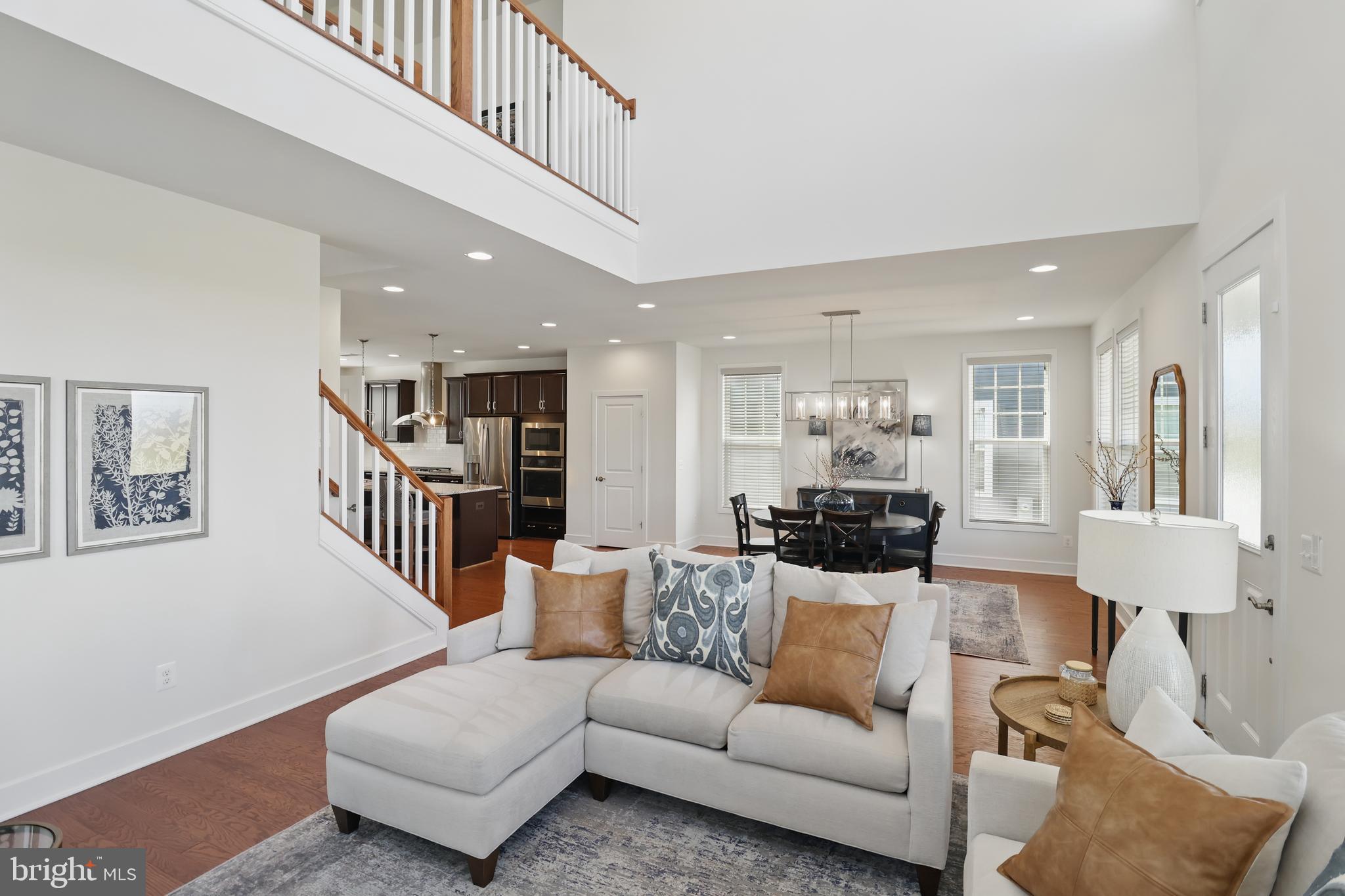 1010 Coubertin Drive Southeast Leesburg, VA 20175 - Photo 9 of 44 a living room with furniture and a table