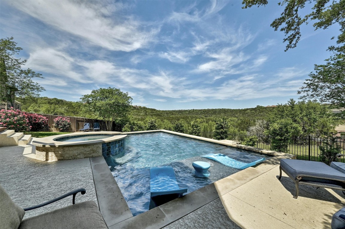 Pool with hill country view.