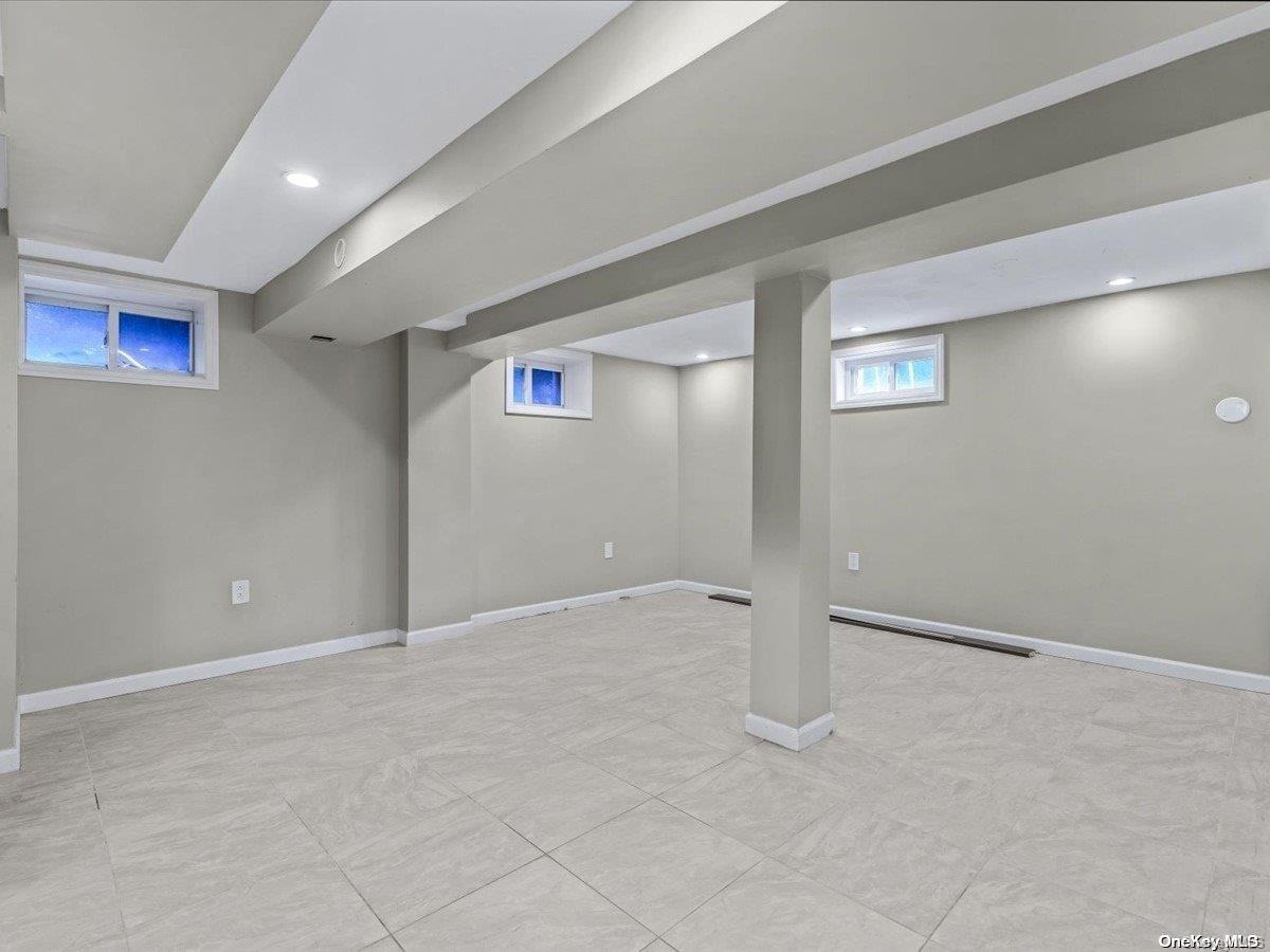 33-71 161st Street Queens, NY 11358 - Photo 29 of 35 an empty room with windows