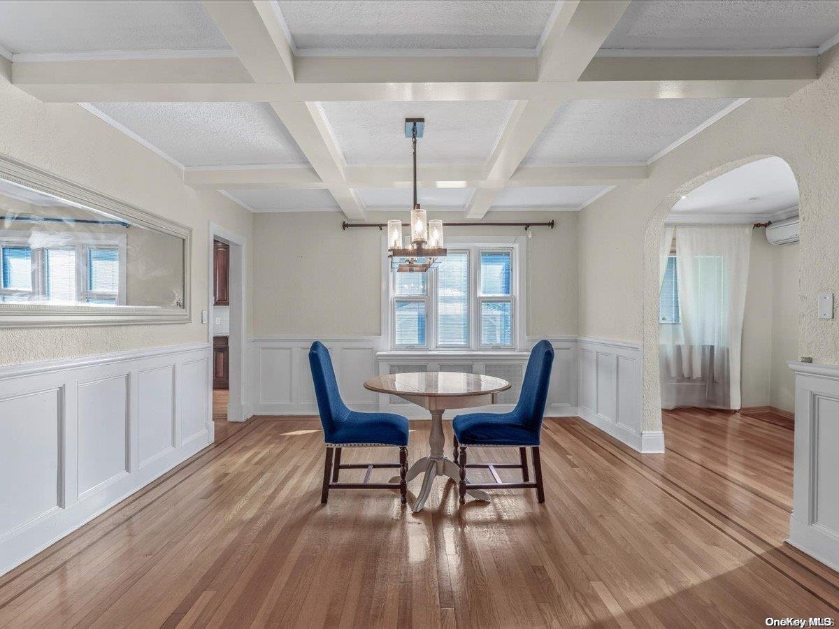 33-71 161st Street Queens, NY 11358 - Photo 5 of 35 a view of a dining room with furniture window and wooden floor