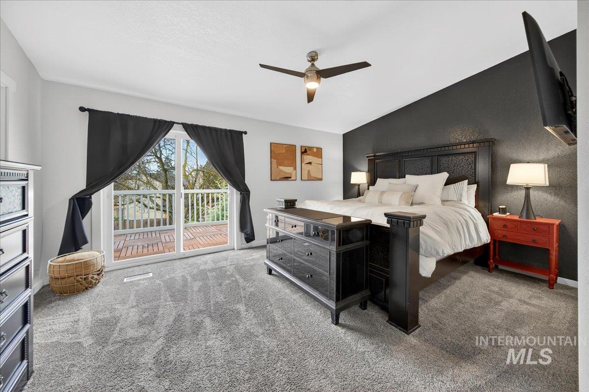 760 Meaghan Place Boise, ID 83712 - Photo 22 of 38 Bedroom featuring carpet floors, ceiling fan, lofted ceiling, and access to outside