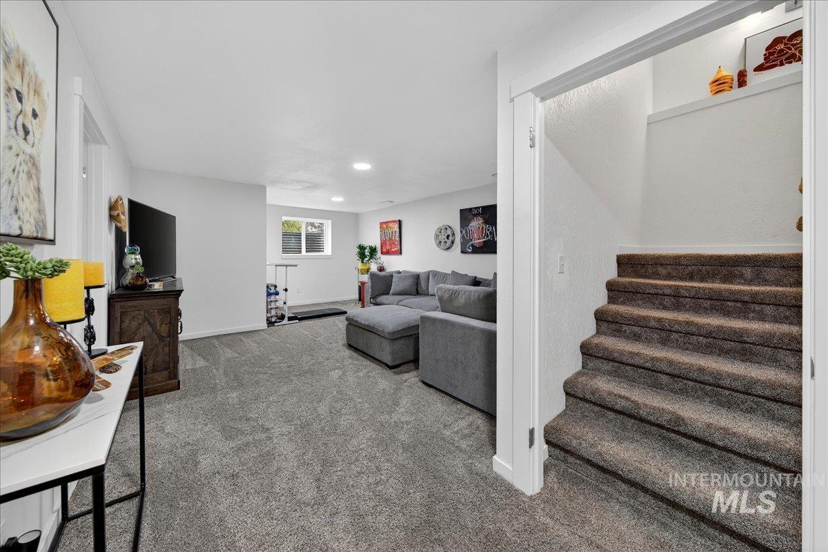 760 Meaghan Place Boise, ID 83712 - Photo 31 of 38 Living room featuring carpet floors and recessed lighting