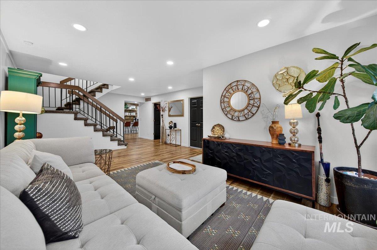 760 Meaghan Place Boise, ID 83712 - Photo 9 of 38 Living area featuring wood finished floors and recessed lighting