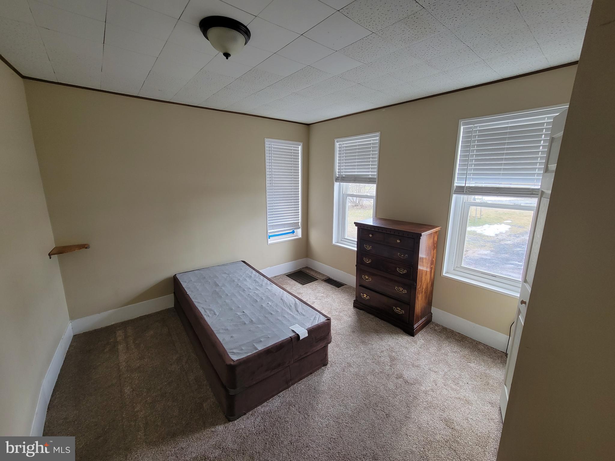 923 Walnut Street, Unit 1 Royersford, PA 19468 - Photo 4 of 14 a living room with furniture and a flat screen tv