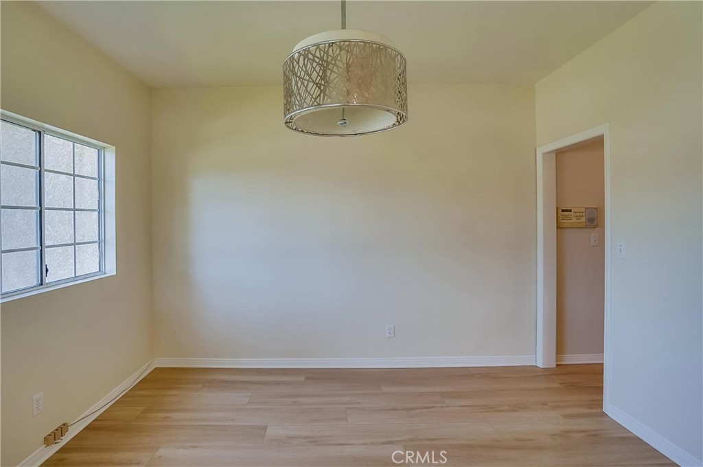 19614 Darien Place Torrance, CA 90503 - Photo 14 of 72 a view of a room with wooden floor and a window