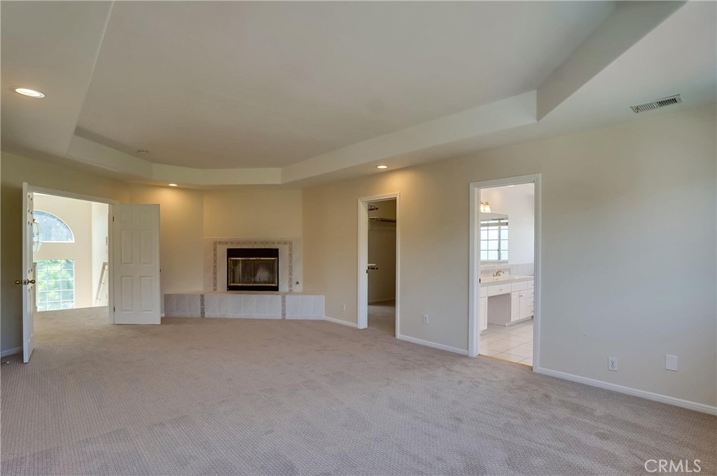 19614 Darien Place Torrance, CA 90503 - Photo 32 of 72 an empty room with windows and cabinet