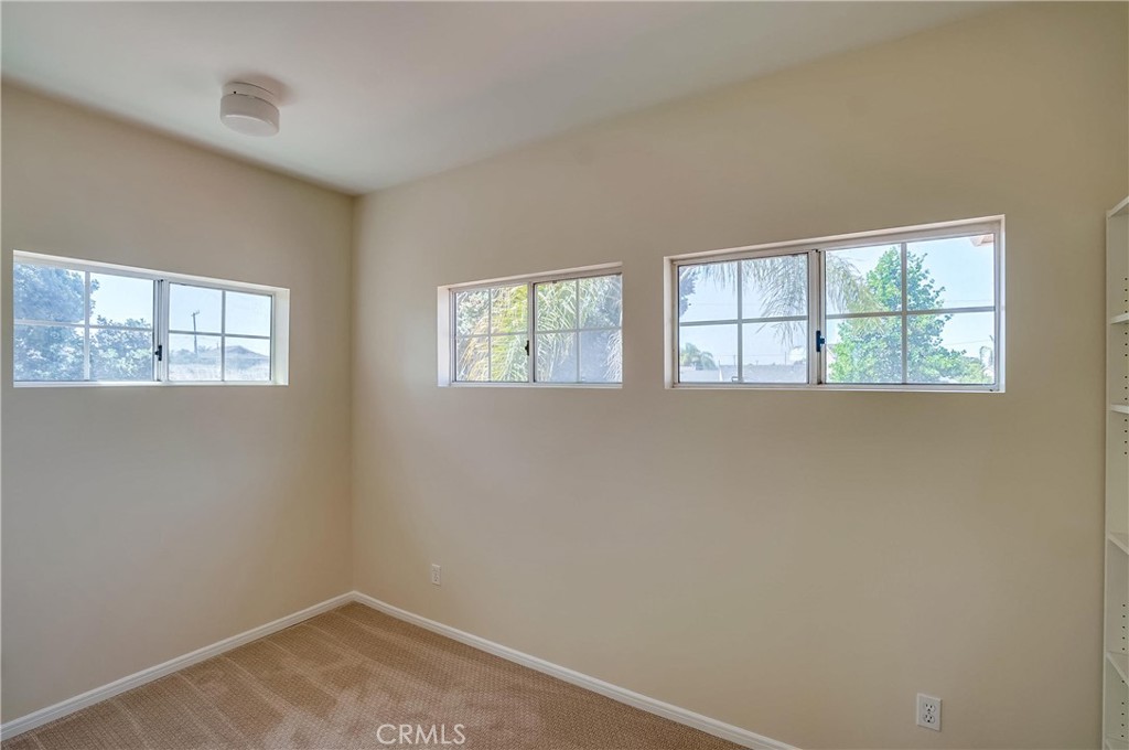 19614 Darien Place Torrance, CA 90503 - Photo 42 of 72 an empty room with windows