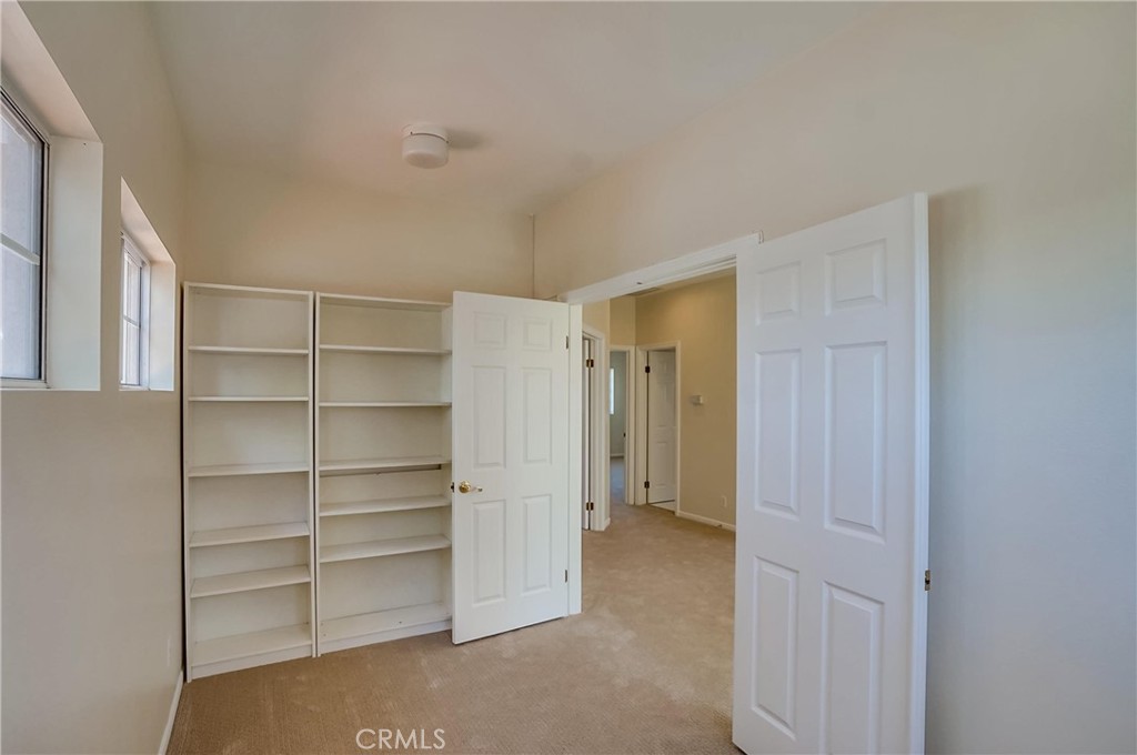 19614 Darien Place Torrance, CA 90503 - Photo 44 of 72 a view of walk in closet with empty racks